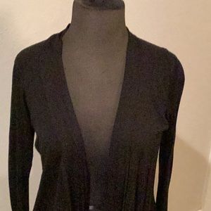 Black shrug, short in front long in back